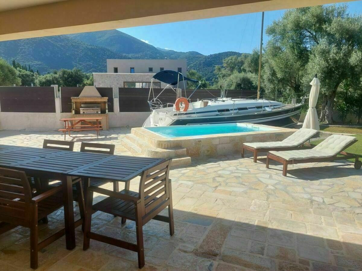 a-lovely-villa-with-a-super-garden-and-pool-in-nidri-villa