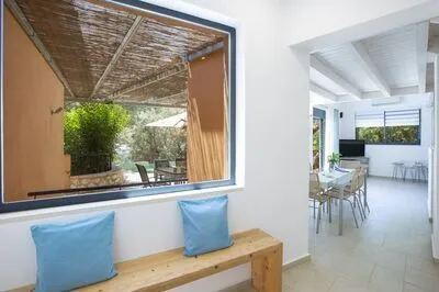 Villa Amoudia - Luxury Villa right on the beach with Private Pool