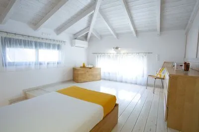 Villa Amoudia - Luxury Villa right on the beach with Private Pool