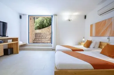 Villa Amoudia - Luxury Villa right on the beach with Private Pool