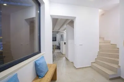 Villa Amoudia - Luxury Villa right on the beach with Private Pool